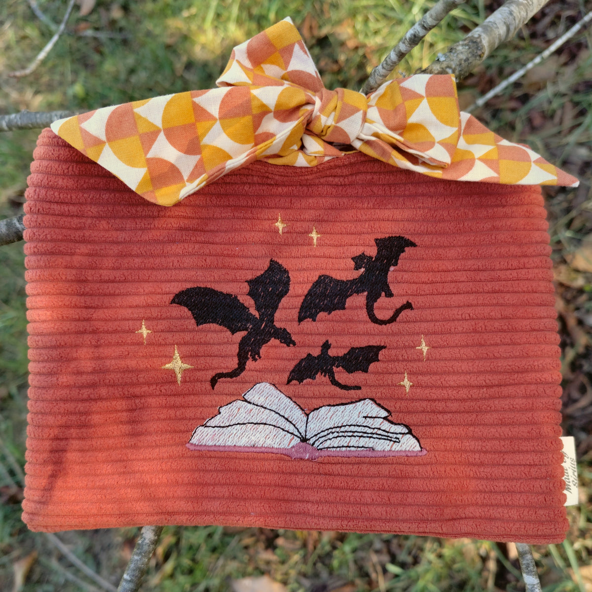 Pochette a livre de Poche "Livre et dragons"